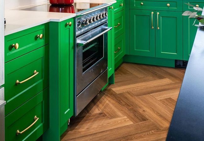 Twelve Oaks Wishbone Herringbone Classic Auburn Luxury Vinyl Plank view 2