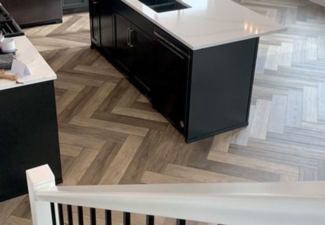 Twelve Oaks Wishbone Luxury Vinyl Herringbone Divine Elm view 2